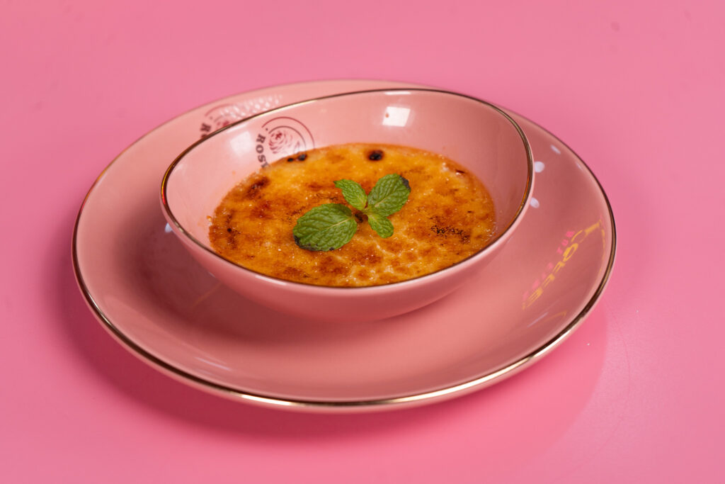 Elegant rose pudding dessert from the Rose Oud Café menu