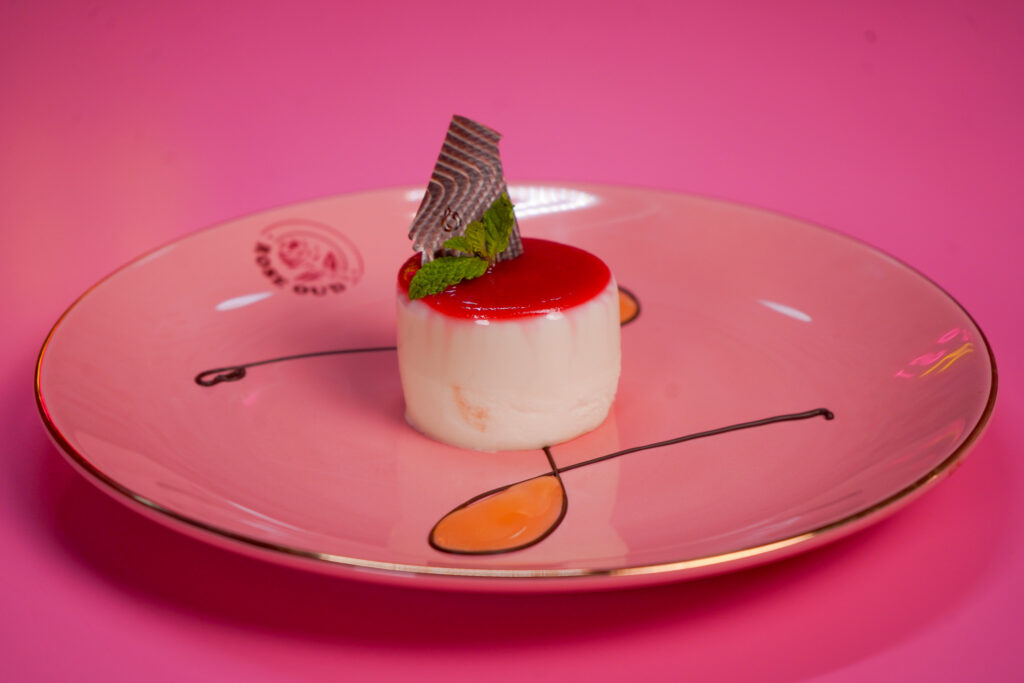 Signature dessert plate with layered cake and oud-flavored cream
