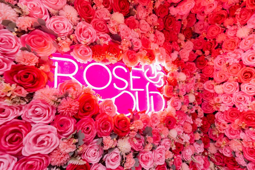 Interior of Rose Oud Café with rose-inspired decor and ambient lighting