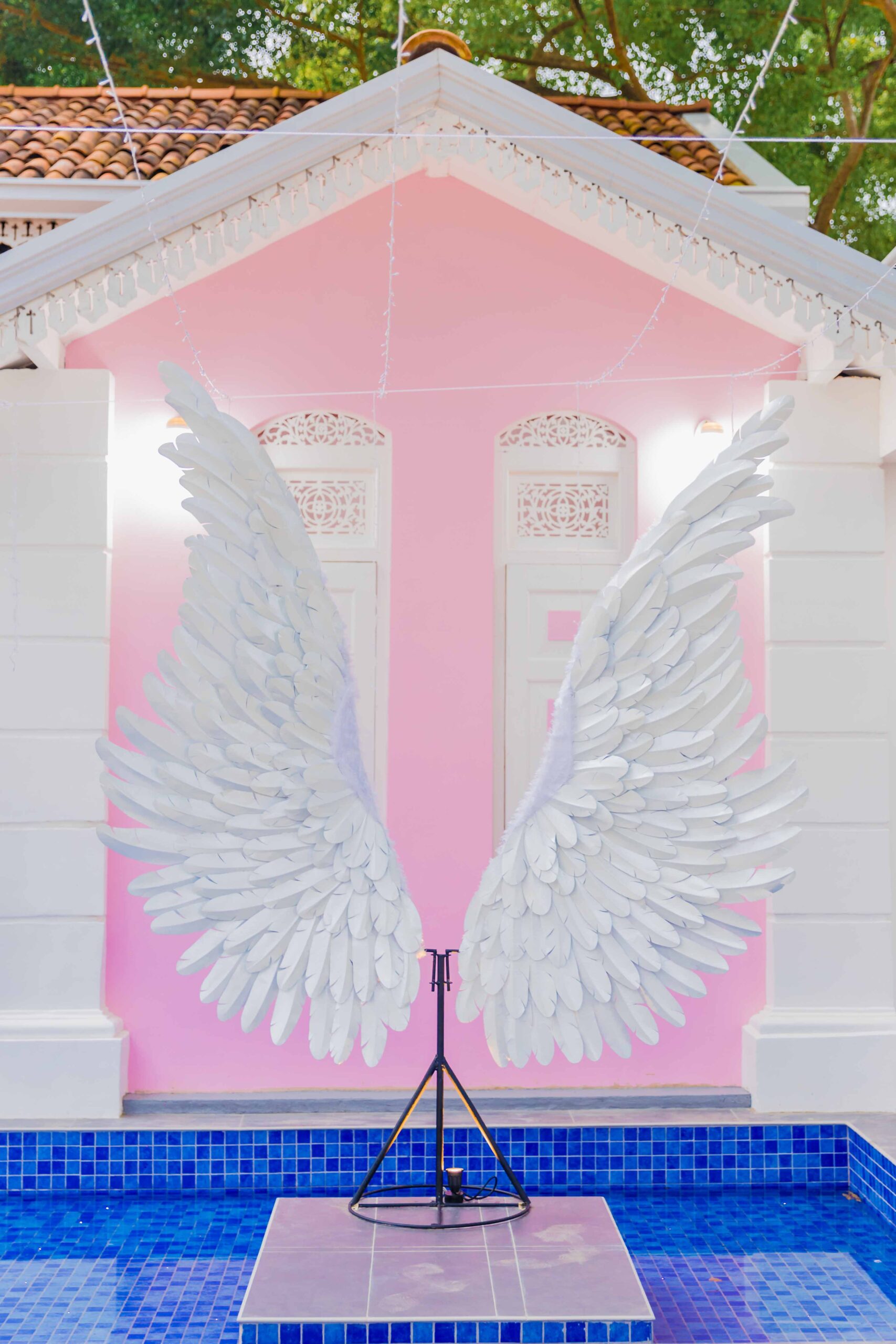 Outdoor seating area at Rose Oud Café with floral decor